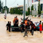マレーシアのラーク6万人々が洪水によって変位