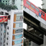 中華人民共和国東部の重慶市の19階建ての建物は電車のトラックに特有のものです